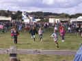 Children running back after the display